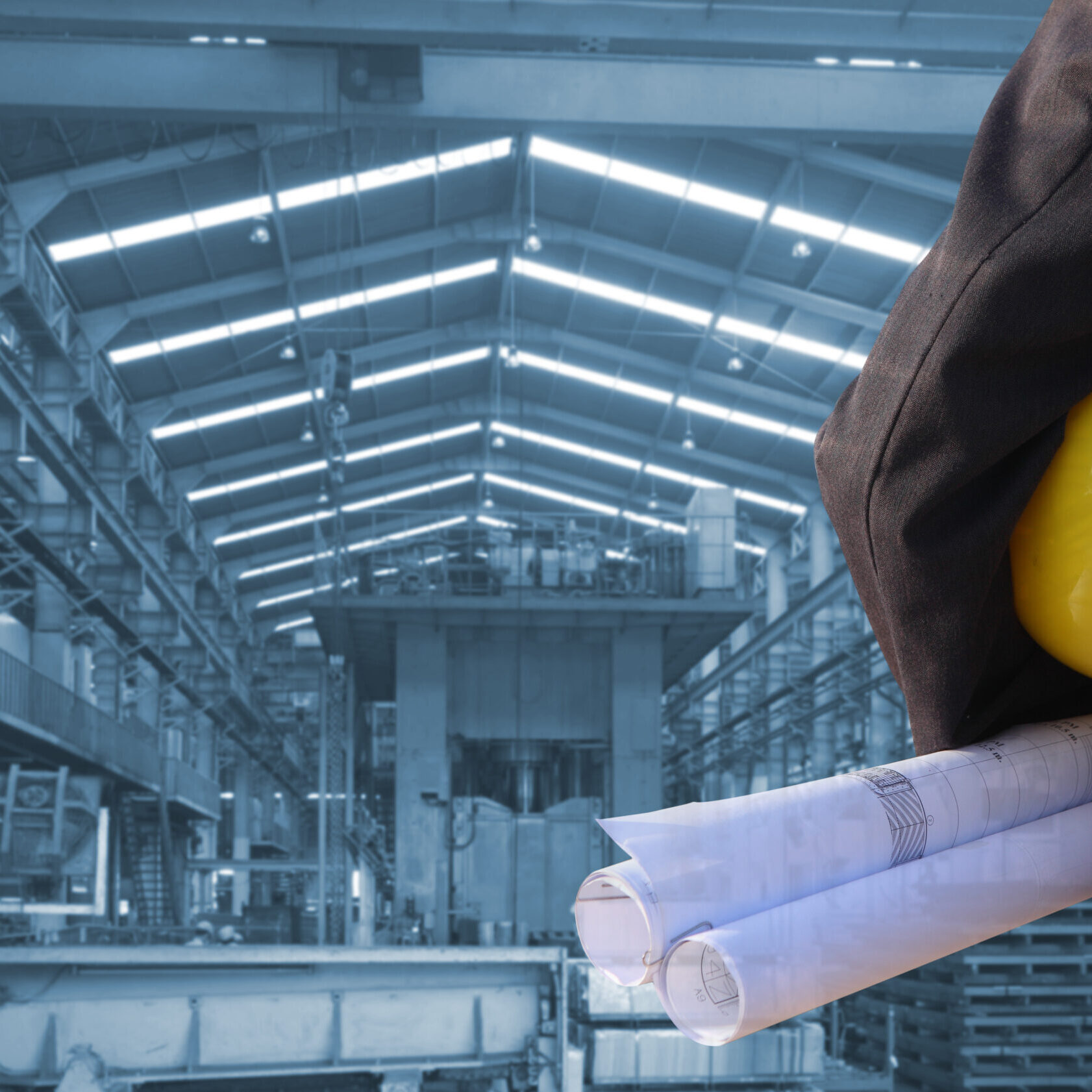 production engineer working in  commercial business building with the structural steel structure